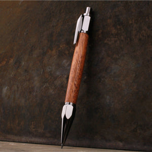 
                  
                    African Mahogany 2mm mechanical pencil by Forsaken Forest Designs.
                  
                