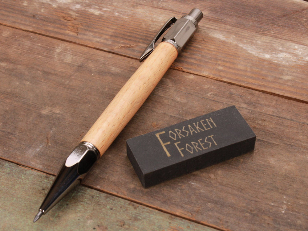 
                  
                    Beech wood 2mm mechanical pencil with black eraser by Forsaken Forest Designs.
                  
                