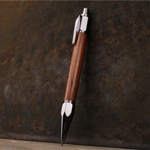 
                  
                    Bolivian Rosewood 2mm mechanical pencil by Forsaken Forest Designs.
                  
                
