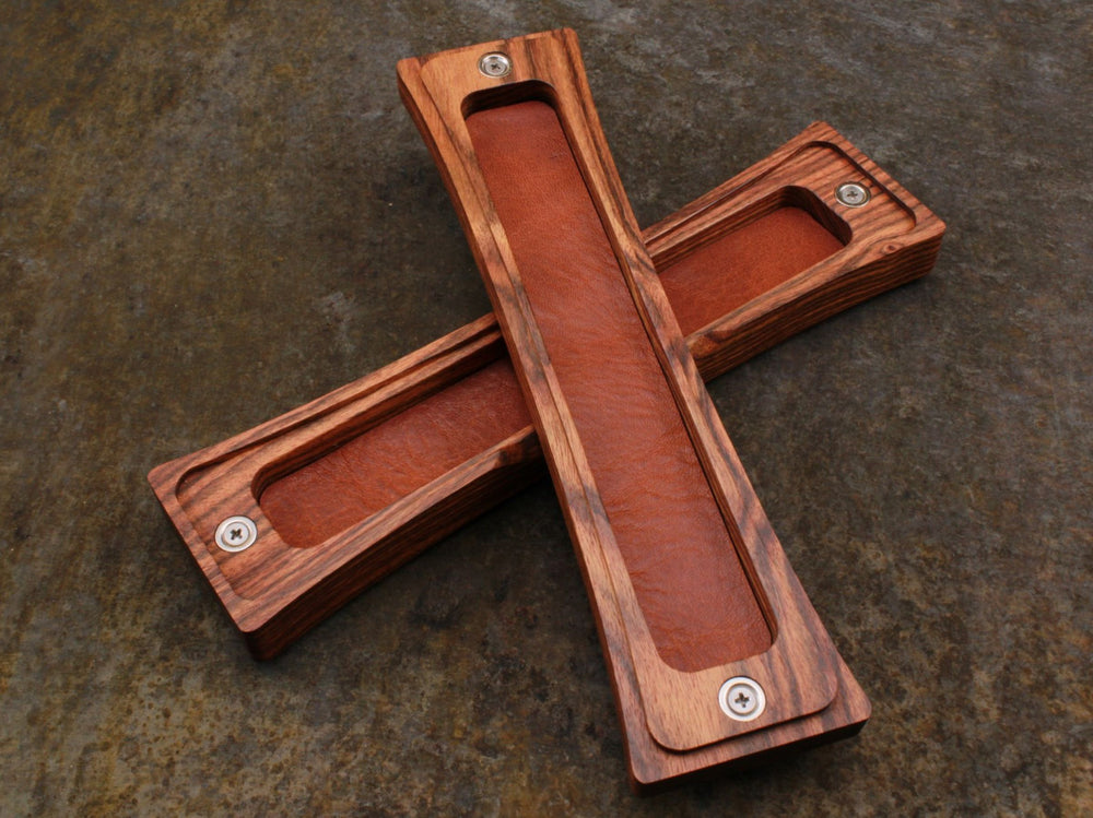 
                  
                    Chechen (Black Poisonwood) dice box with brown leather liner by Forsaken Forest Gaming.
                  
                