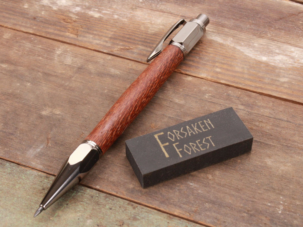 
                  
                    Leopardwood 2mm mechanical pencil with black eraser by Forsaken Forest Gaming.
                  
                