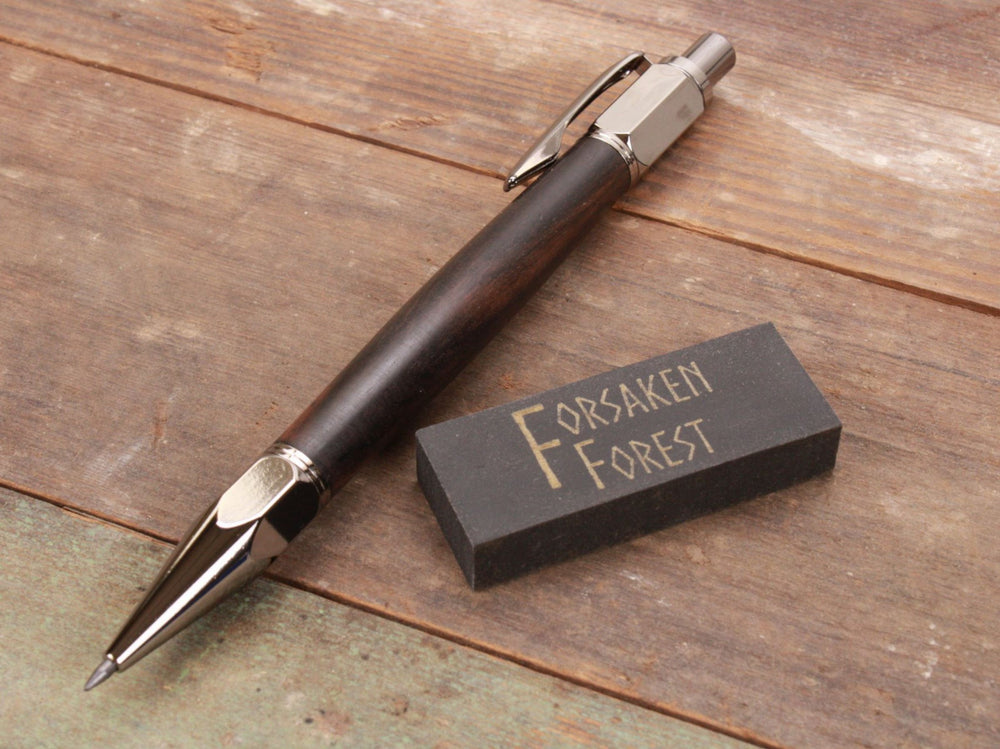 
                  
                    Macassar Ebony wood 2mm mechanical pencil with black eraser by Forsaken Forest Gaming.
                  
                