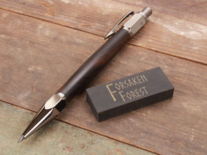 
                  
                    Macassar Ebony wood 2mm mechanical pencil with black eraser by Forsaken Forest Gaming.
                  
                