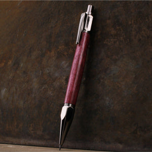 
                  
                    Purpleheart wood 2mm mechanical pencil by Forsaken Forest Gaming.
                  
                